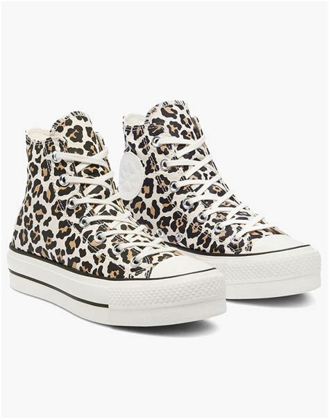 converse leopard print high tops.